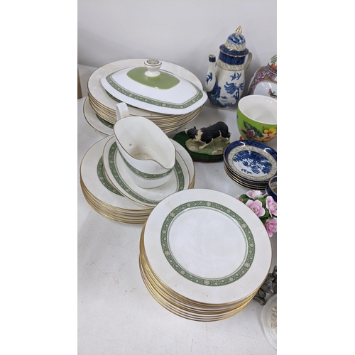 425 - A mixed lot to include two Clarice Cliff Honeyglaze bizarre platters, Booths blue and white china an... 