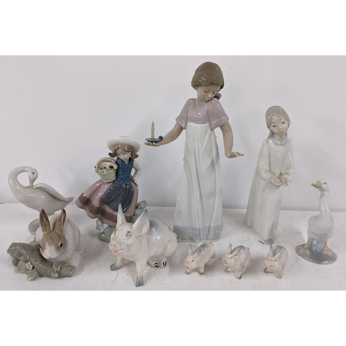 426 - A collection of Lladro and Nao ornaments together with a Beswick pig and others
Location: 1-2
If the... 