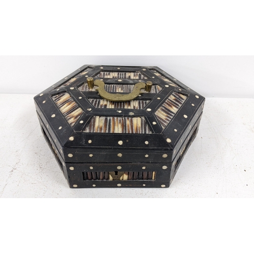 428 - A Victorian porcupine and lacquered octagonal box having a hinged lid with brass handle
Location: RW... 