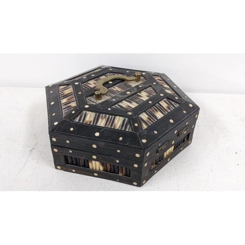 428 - A Victorian porcupine and lacquered octagonal box having a hinged lid with brass handle
Location: RW... 