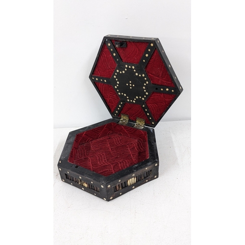 428 - A Victorian porcupine and lacquered octagonal box having a hinged lid with brass handle
Location: RW... 