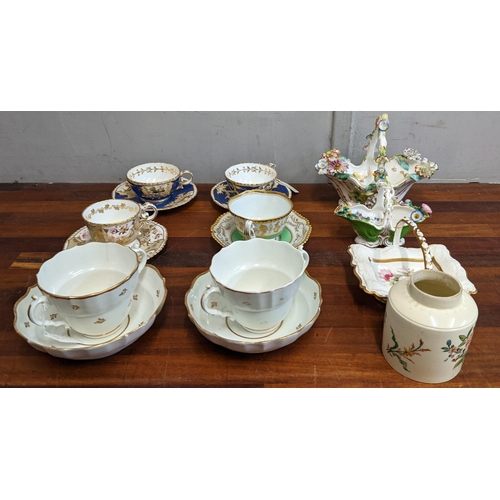 43 - A collection of ceramics to include Coalport style floral encrusted ceramic baskets, a flight, Barr ... 