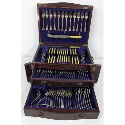 430 - An early 20th century canteen of silver plated cutlery, housed in a mahogany and boxwood inlaid case... 