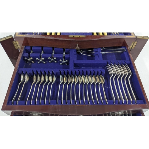 430 - An early 20th century canteen of silver plated cutlery, housed in a mahogany and boxwood inlaid case... 