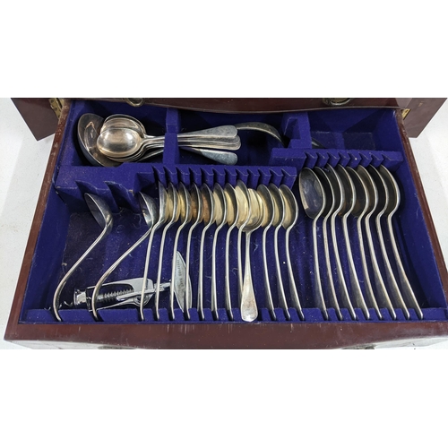 430 - An early 20th century canteen of silver plated cutlery, housed in a mahogany and boxwood inlaid case... 