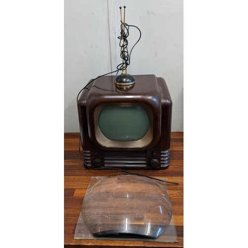 48 - A circa 1950s Bush TV 22 Bakelite television can be used to watch DVDs with a converter along with a... 