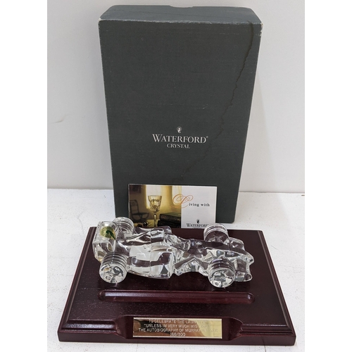 52 - A Waterford crystal boxed model of a racing car, with a treen plinth having an engraved plaque
Locat... 