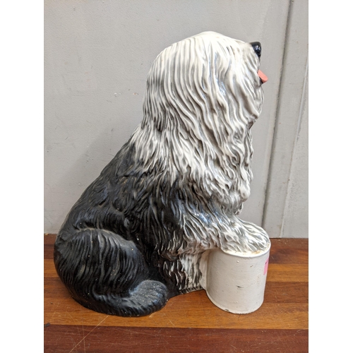 6 - A Beswick model of the Dulux dog Location:1.2
If there is no condition report shown, please request