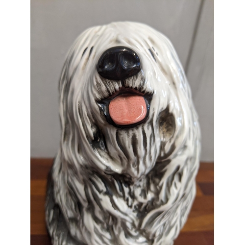 6 - A Beswick model of the Dulux dog Location:1.2
If there is no condition report shown, please request