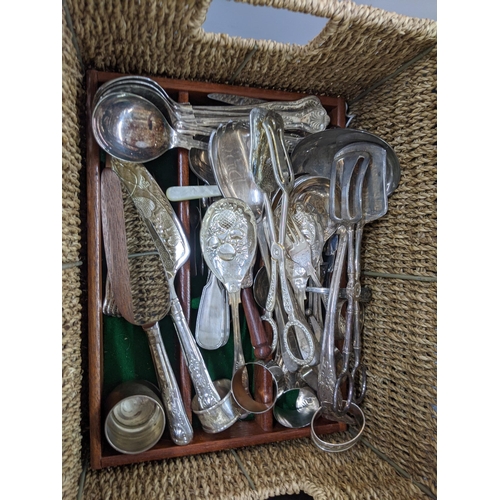 60 - Silver and silver plated items to include napkin rings, assorted cutlery, tongs, cake servers and ot... 