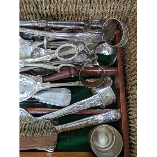 60 - Silver and silver plated items to include napkin rings, assorted cutlery, tongs, cake servers and ot... 