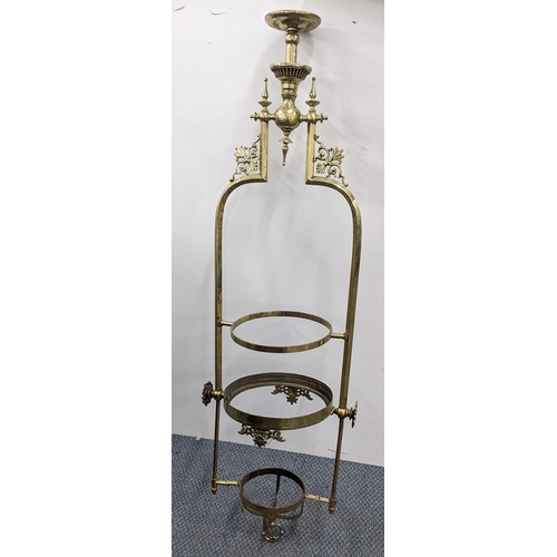 63 - A Victorian brass ceiling hanging in three section lantern
Location:RAB
If there is no condition rep... 