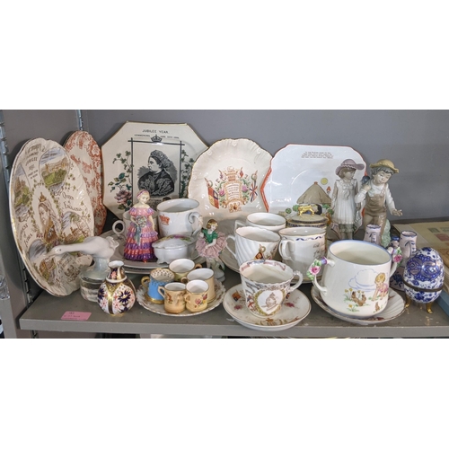 92 - A mixed lot of china and ceramics to include commemorative ware, a Lladro model, two Nao figures and... 