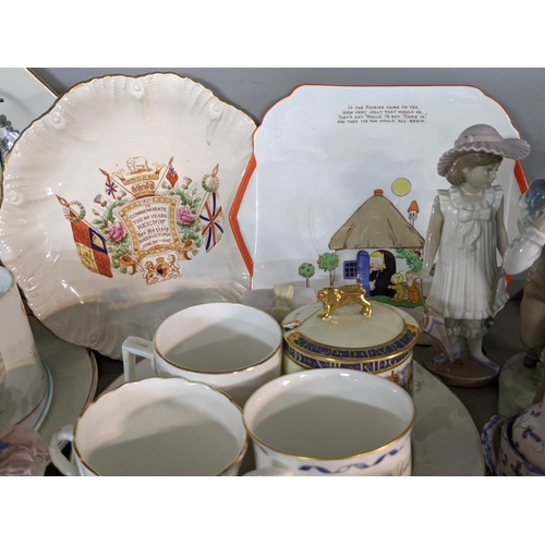 92 - A mixed lot of china and ceramics to include commemorative ware, a Lladro model, two Nao figures and... 