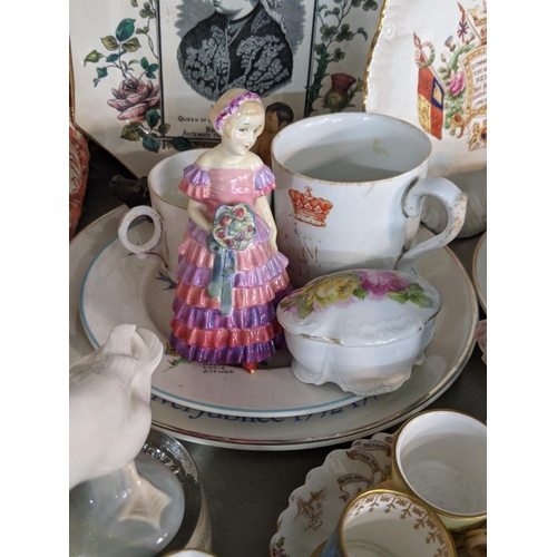 92 - A mixed lot of china and ceramics to include commemorative ware, a Lladro model, two Nao figures and... 