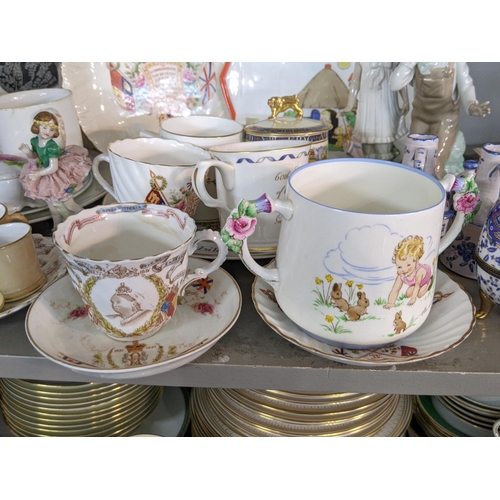 92 - A mixed lot of china and ceramics to include commemorative ware, a Lladro model, two Nao figures and... 