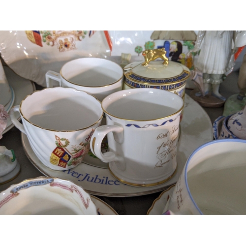 92 - A mixed lot of china and ceramics to include commemorative ware, a Lladro model, two Nao figures and... 