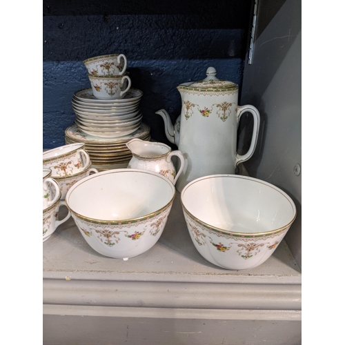 93 - An Aynsley Bridgwood tea and coffee service to include cups and saucers with a tea and coffee pot Lo... 