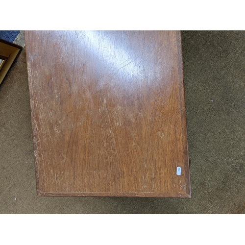 94 - A G-Plan teak coffee table on short tapered legs united by an underlying shelf Location:BWR
If there... 