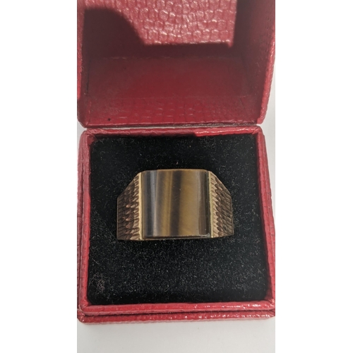 1 - A 9ct gold and tiger eye gents signet ring size 5½, 6.7g
Location: CAB 10
If there is o condition re... 