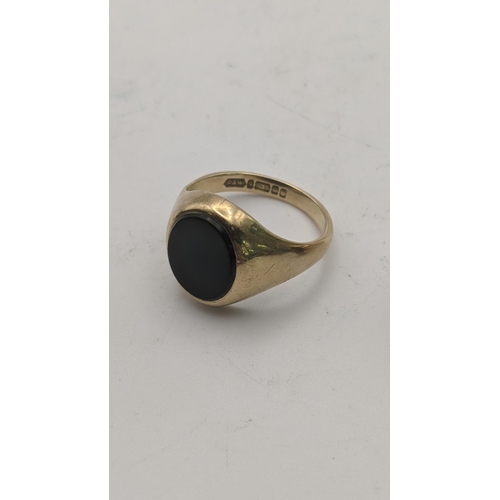 12 - Two 9ct gold rings to include a black onyx signet ring and one other total weight 8.1g
Location: RIN... 