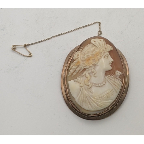 20 - A Victorian 9ct gold cameo brooch and safety chain 26.2g
5.6cm x 4.5cm 
Location: CAB 8
If there is ... 