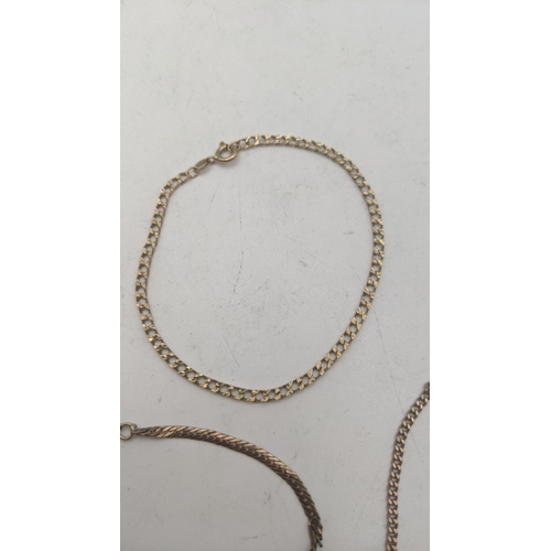 30 - Three 9ct gold bracelets to include a square link bracelet together with two others
Location: CAB 8
... 