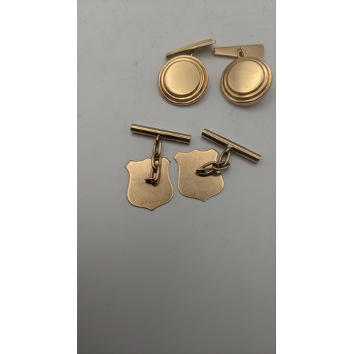 33 - Two pairs of gold cufflinks to include a pair of 9ct shield shaped cufflinks and a pair tested as 9c... 