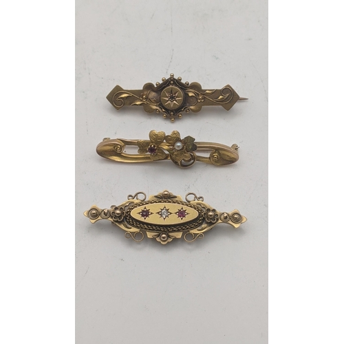 40 - Three 15ct gold Victorian brooches all with later pins (1 9ct one tested as 9ct and the other steel)... 