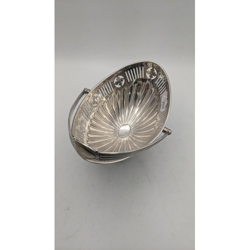 43 - A Lee and Wigfull silver pedestal basket with pierced decorative borders hallmarked Sheffield 1904, ... 