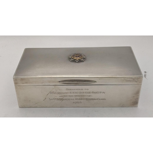 45 - A silver cigarette box with an engine turned lid and also having a Royal army service corks to the t... 