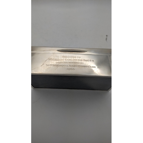 45 - A silver cigarette box with an engine turned lid and also having a Royal army service corks to the t... 