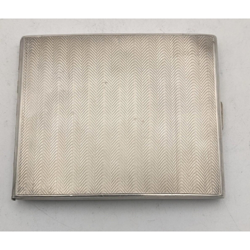 47 - A RN silver cigarette case hallmarked Birmingham 1925 having engine turned wavy design, total weight... 