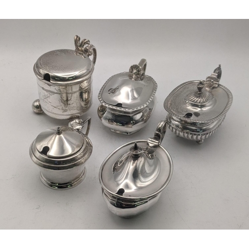 A group of 5 silver mustard pots, 4 having blue glass liners total weight excluding the glass 423.4g
Location: A2B
If there is condition report shown, please request