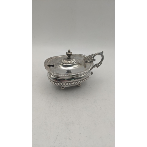 55 - A group of 5 silver mustard pots, 4 having blue glass liners total weight excluding the glass 423.4g... 