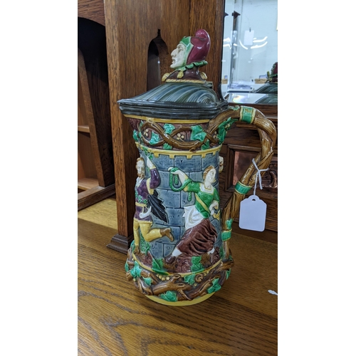 397 - A Mintons majolica Tower jug with a pewter rim A/F
Location: RAB
If there is no condition report sho... 