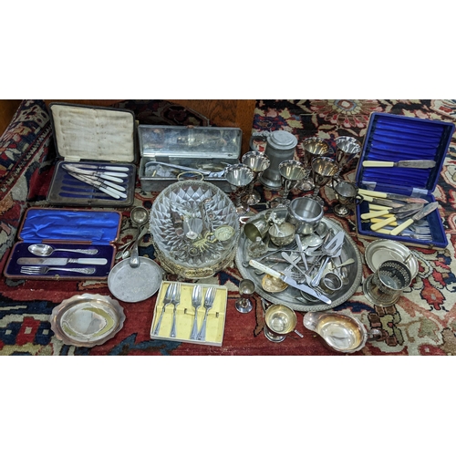 432 - A mixed lot of mainly silver plate to include boxed cutlery, berry spoon, trophies and other items
L... 