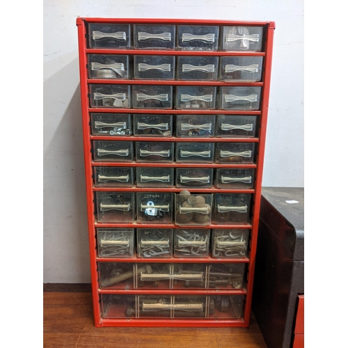 236 - A tool chest with a storage unit containing screws, plugs, pins, caps and other items
Location:RWM
I... 