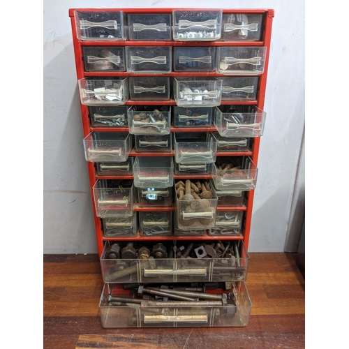 236 - A tool chest with a storage unit containing screws, plugs, pins, caps and other items
Location:RWM
I... 