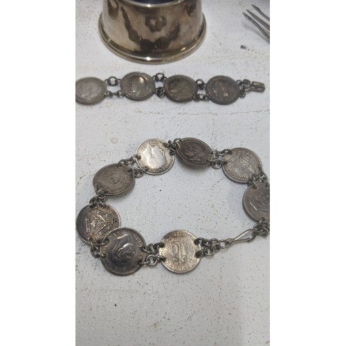 257 - Silver to include two British coin bracelets, a child's bangle, sterling silver pickle for, silver h... 