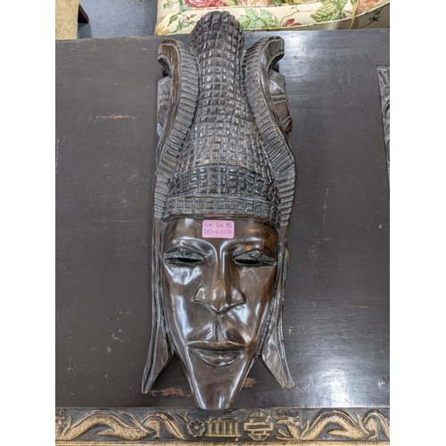 210 - A pair of Indonesian carved hardwood masks
Location: BWR
If there is no condition report shown, plea... 