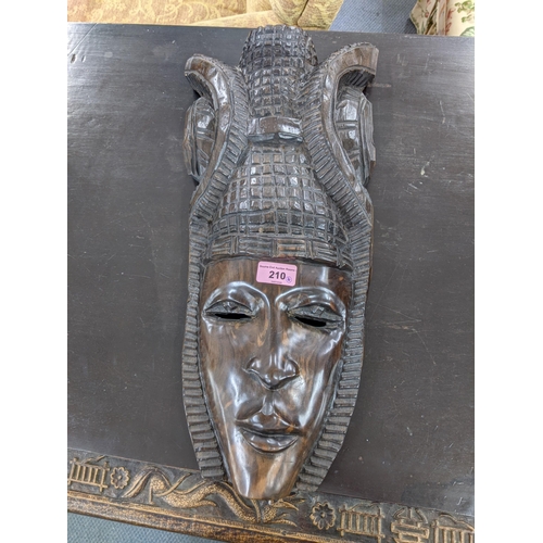 210 - A pair of Indonesian carved hardwood masks
Location: BWR
If there is no condition report shown, plea... 