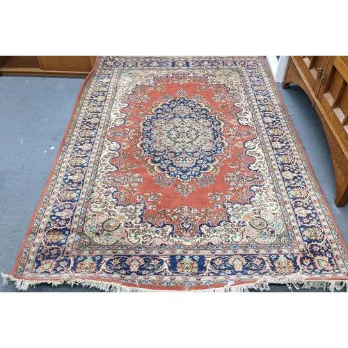 337 - A Persian hand woven rug having a central motif, floral design and multiguard borders, 255cm x 176cm... 