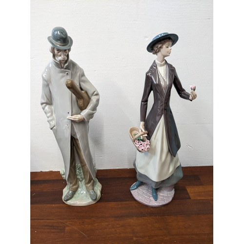 403 - Two Lladro figurines to include 'Old Man with Violin' and 'Tokens of Love' both in original boxes
Lo... 