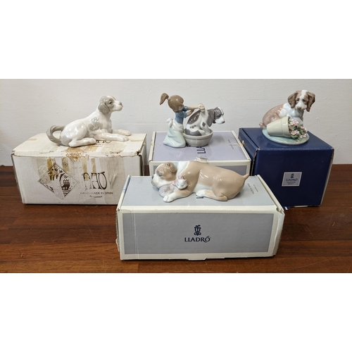 405 - Dog related Lladro porcelain figures to include 'Unlikely Friends', Nao by Lladro 'Dog Lying Down', ... 