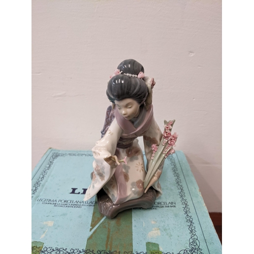 409 - Lladro 'Geisha in Garden' porcelain figurine, unboxed with a boxed Lladro 'Geisha Girl' figure
Locat... 