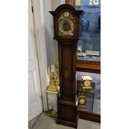 443 - A 1930s oak cased grandmother clock with barley twist columns Location: FOYER
If there is no conditi... 