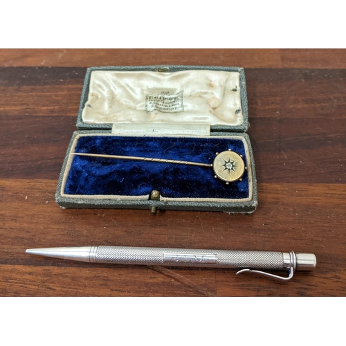 445 - A silver Mappin & Webb propelling pencil and a part gold and diamond stick pin
Location: CAB
If ther... 