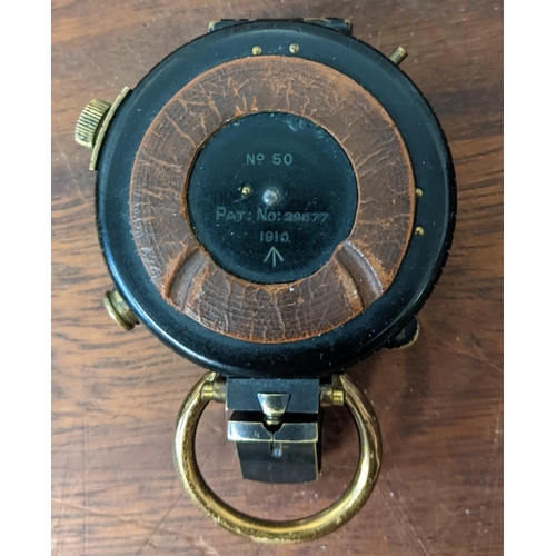 446 - A Barker & Son marching military compass No50 in a leather case, a brass cased compass in leather ca... 