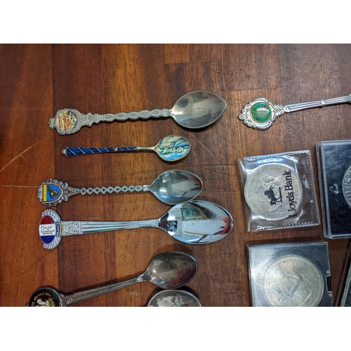 450 - A mixed lot to include commemorative coins and a large collection of souvenir spoons Location: A3F
I... 